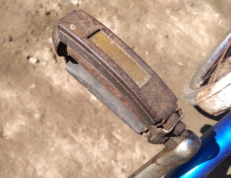 pair of old and crack bicycle pedals